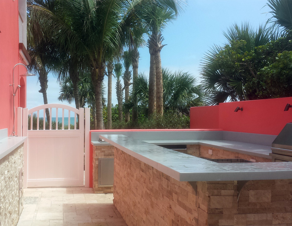 Medium sized beach style patio in Miami.