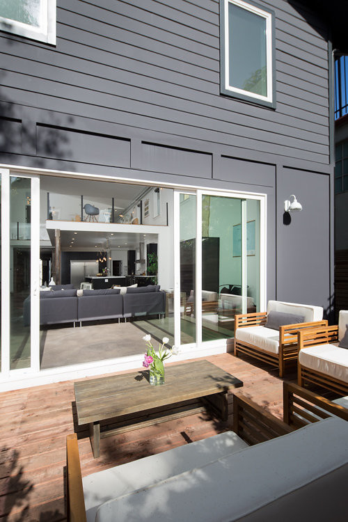Inspiration for a medium sized industrial back patio in San Francisco with decking and no cover.