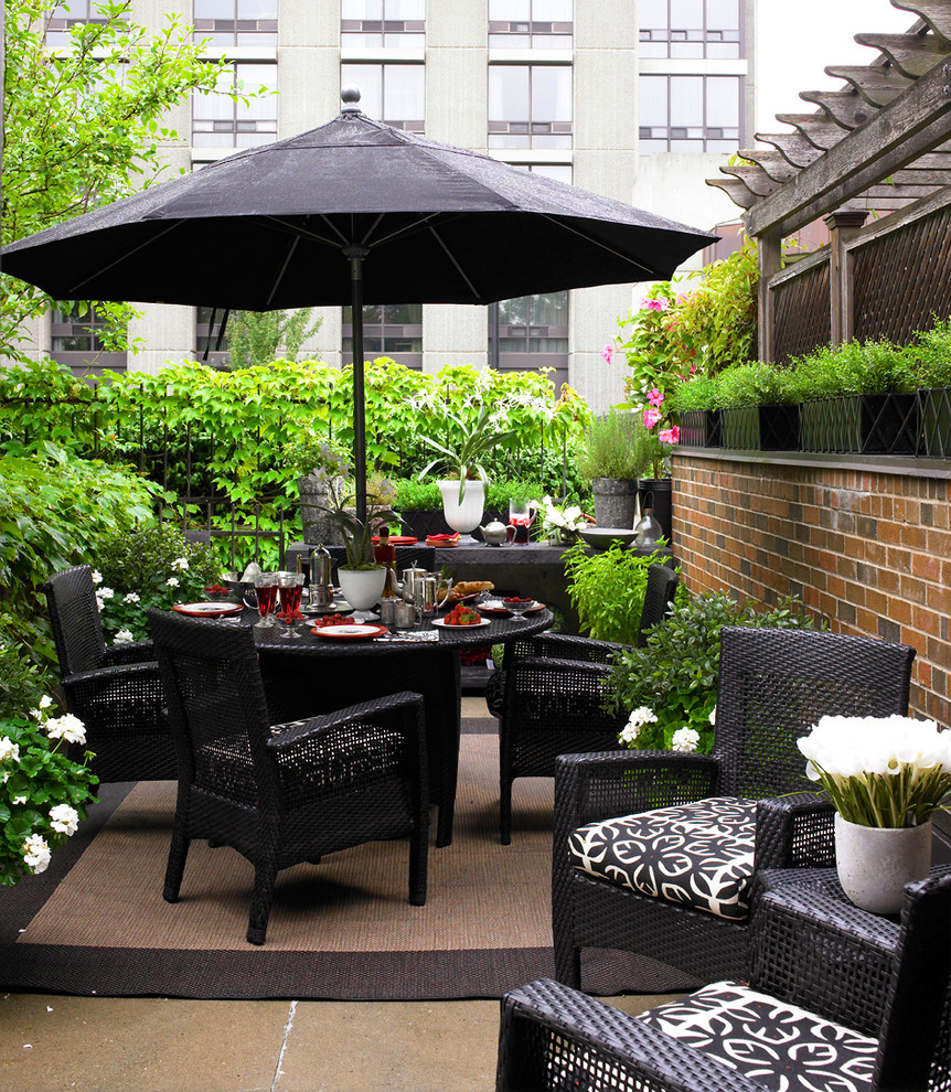 This is an example of a contemporary patio in Toronto with no cover.