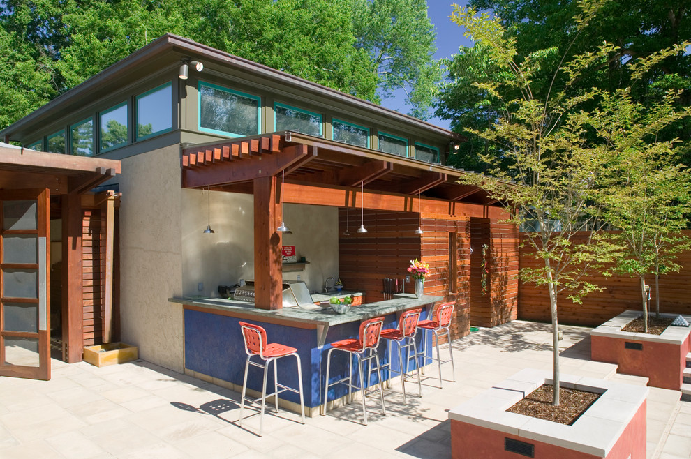 Photo of a contemporary patio in Nashville with a pergola.