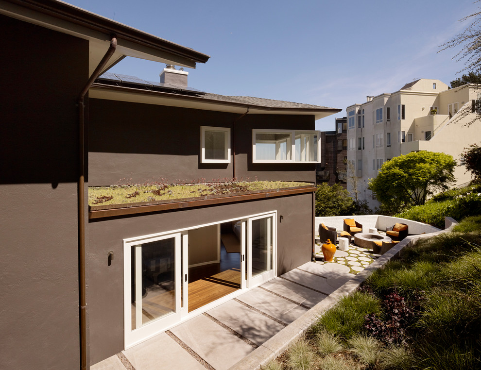 Patio - contemporary backyard patio idea in San Francisco with a fire pit