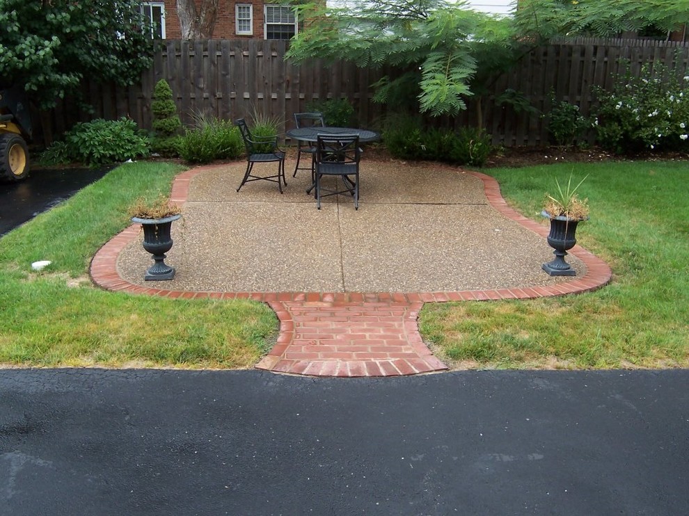 Clayton, Missouri exposed aggregate patio with brick masonry border and