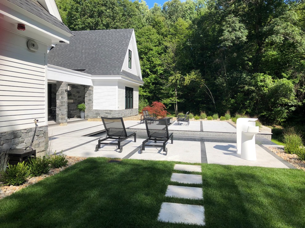 Clean, Contemporary and Cool Backyard Design in Laconia, NH