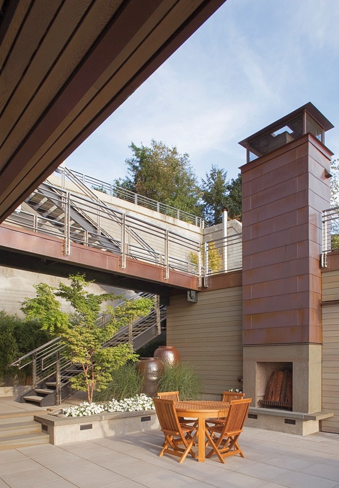 Patio - contemporary courtyard patio idea in Seattle