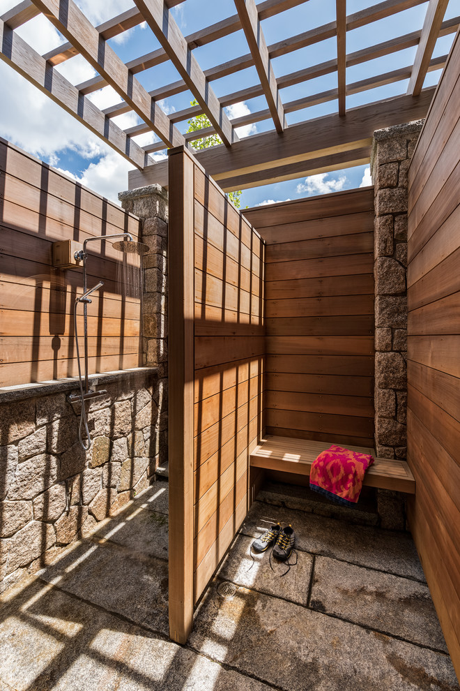 Photo of a coastal patio in Boston with an outdoor shower.