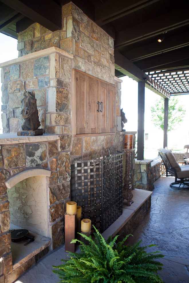 Inspiration for a classic patio in Denver with a fire feature and a pergola.