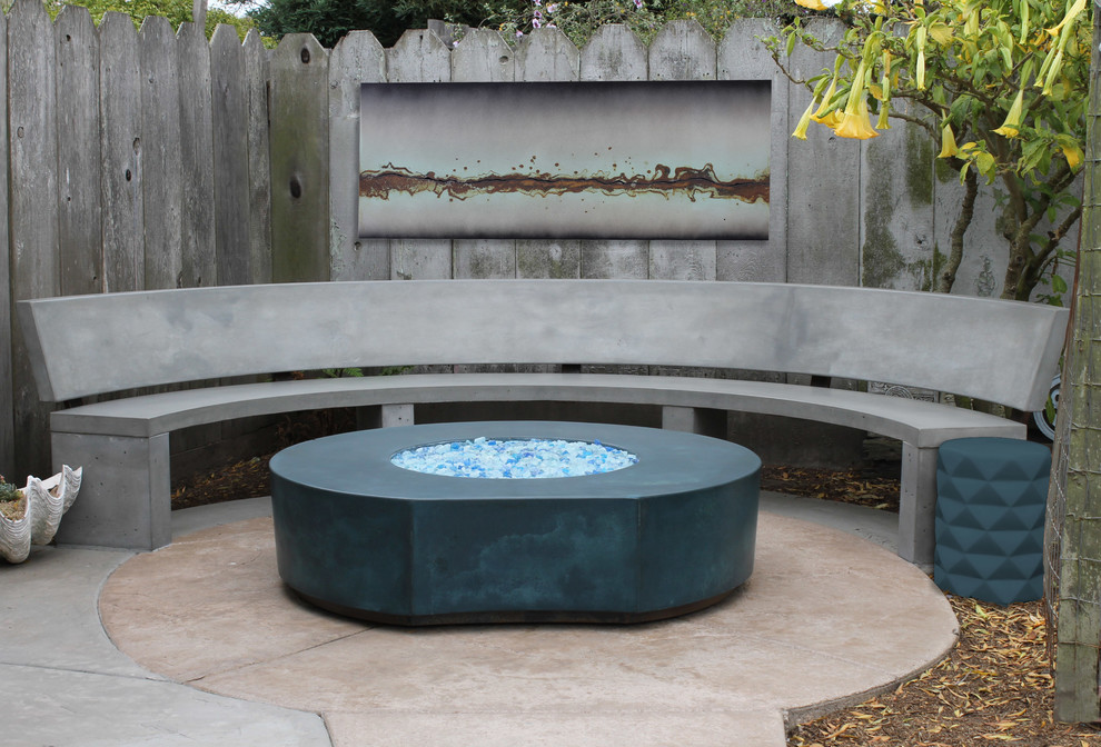 Concrete fire pit lounge area Modern Patio by User Houzz