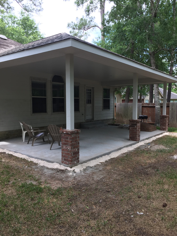 Conroe concrete slab and patio cover Transitional Patio Houston