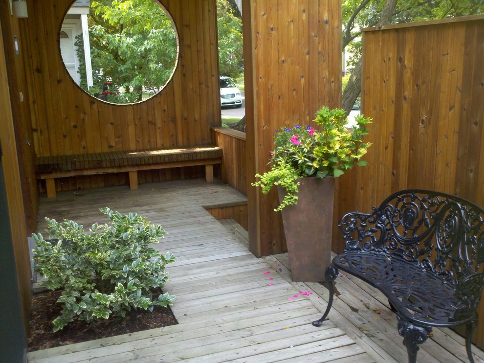 Inspiration for a medium sized traditional front patio in Detroit with decking and no cover.