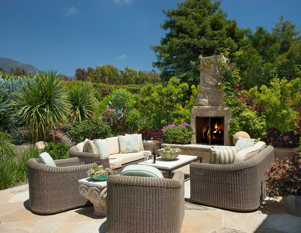 Design ideas for a classic patio in Santa Barbara with a fire feature.