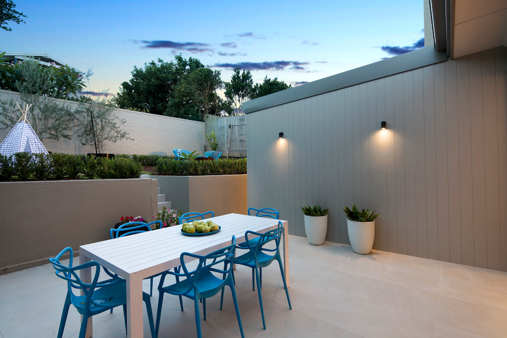 Photo of a contemporary courtyard patio in Sydney with no cover.
