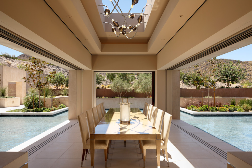 This is an example of a contemporary patio in Las Vegas with tiled flooring.