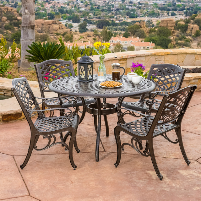 Contemporary Outdoor Patio Featuring Bronze Dining Set
