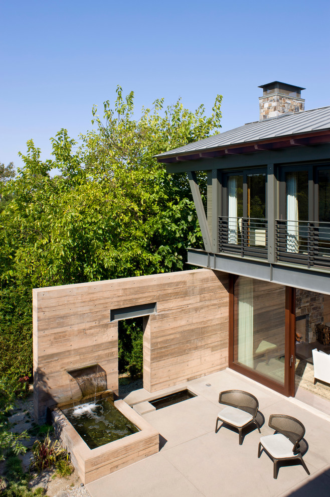 Idées déco pour une terrasse contemporaine avec un point d'eau.