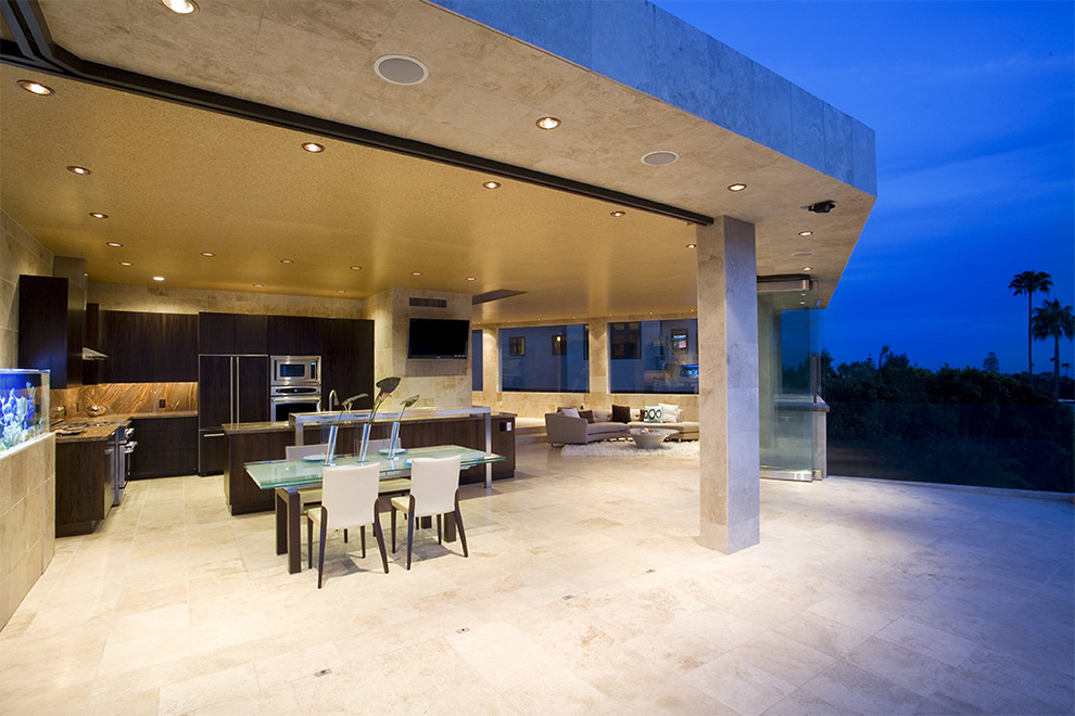 Inspiration for a contemporary patio in Orange County with an outdoor kitchen.