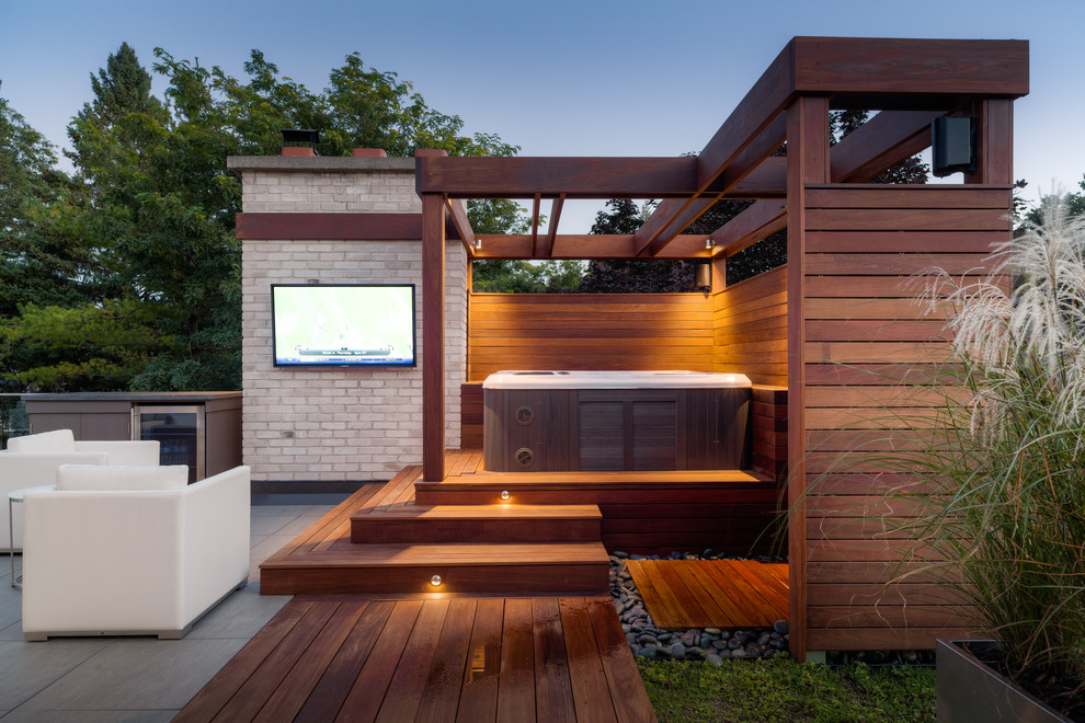 Outdoor patio shower - mid-sized contemporary backyard outdoor patio shower idea in Toronto with decking and a pergola