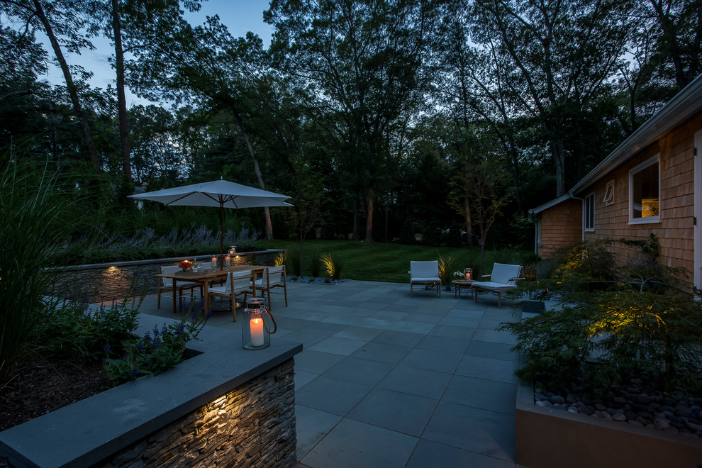 This is an example of a contemporary patio in Providence.