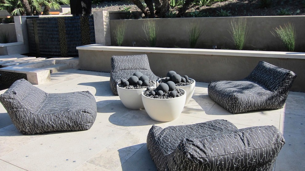 This is an example of a contemporary patio in San Diego with no cover.