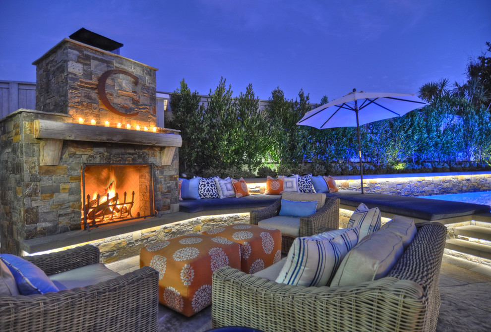 Photo of a classic patio in Orange County with a fire feature and no cover.