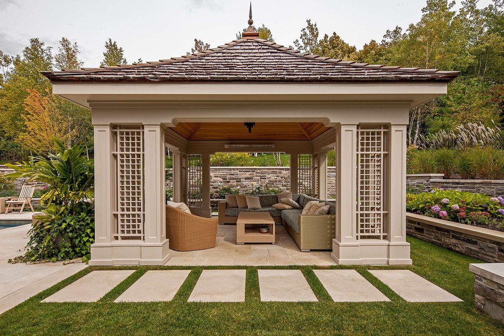 Inspiration for a timeless patio remodel in Toronto with a gazebo