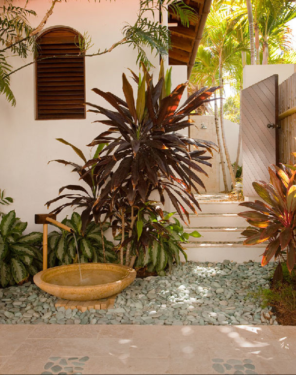 Inspiration for a tropical patio remodel in Portland