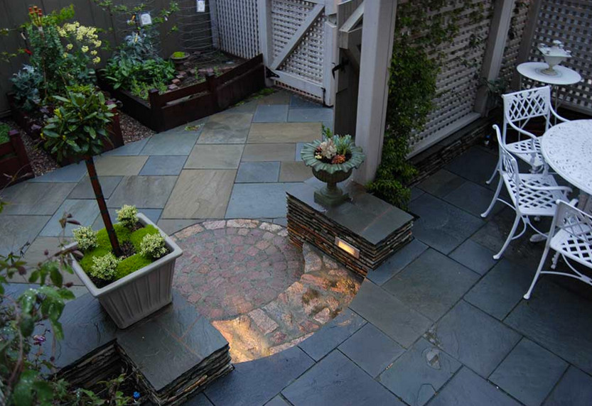 Photo of a medium sized classic courtyard patio in San Francisco with natural stone paving.