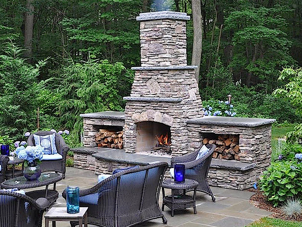 Inspiration for a mid-sized craftsman backyard tile patio remodel in Portland with a fire pit and no cover