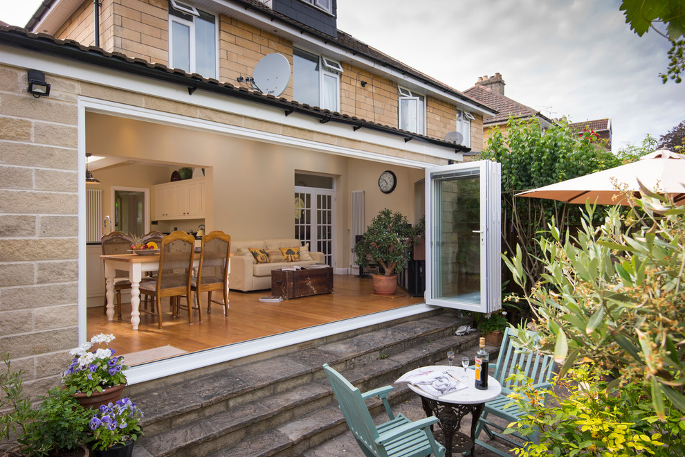 Inspiration for a small contemporary back patio in Buckinghamshire with a potted garden and no cover.
