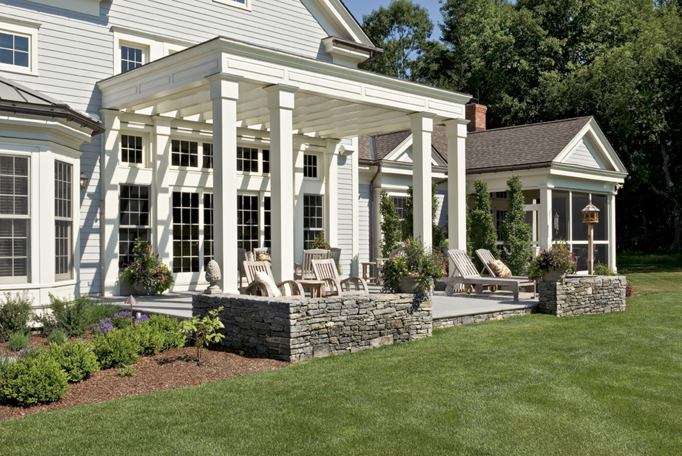 Inspiration for a farmhouse patio remodel in New York