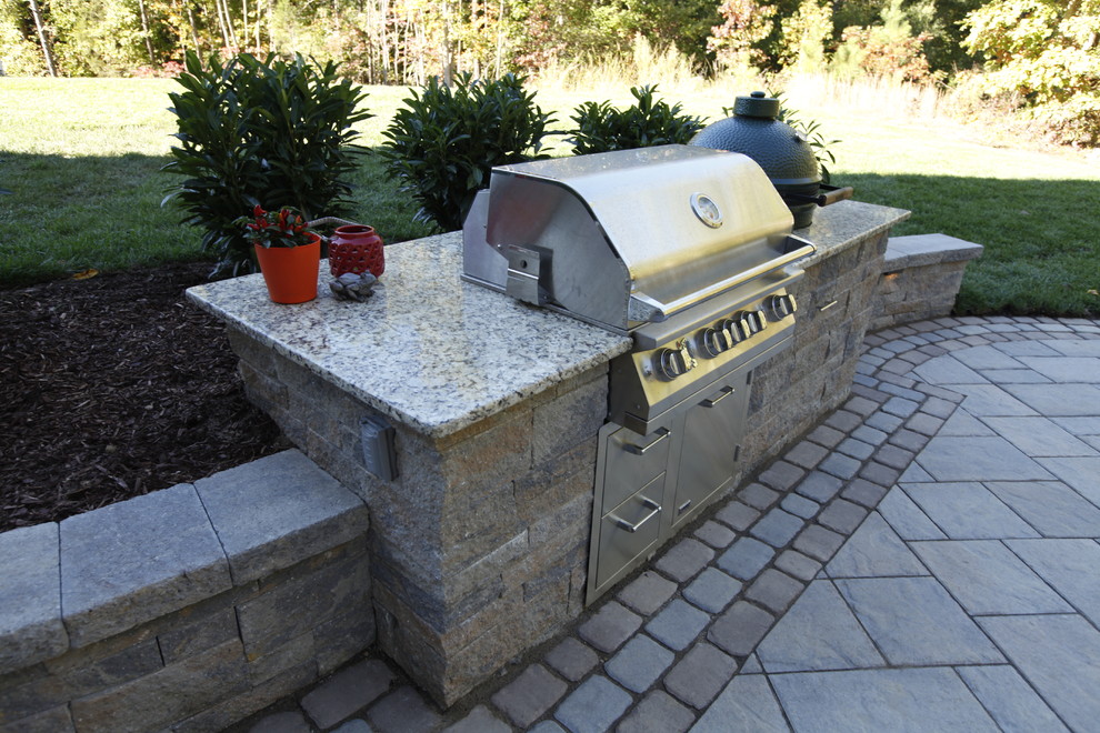 Inspiration for a large classic back patio in Richmond with an outdoor kitchen, concrete paving and no cover.