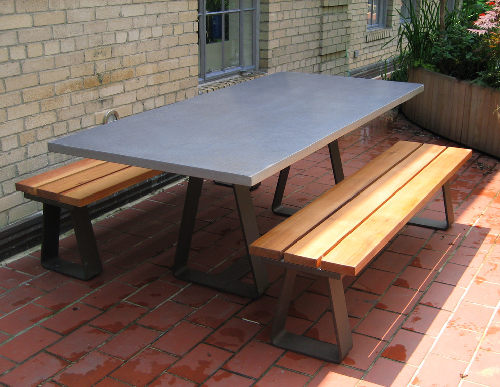 Patio kitchen - large contemporary backyard patio kitchen idea in New York