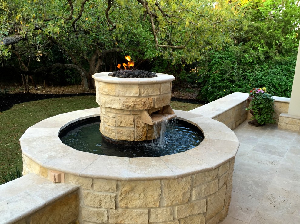 Custom Covered patio with fire/ water feature & outdoor kitchen
