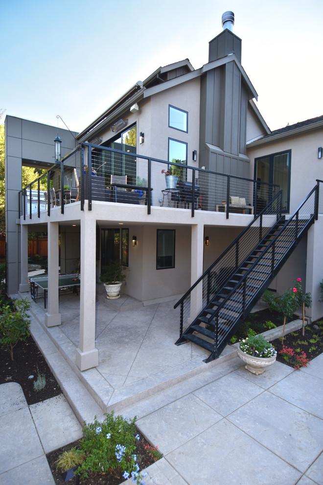 Idée de décoration pour une grande terrasse champêtre avec une cuisine d'été, une cour et une dalle de béton.