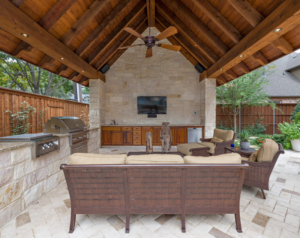This is an example of a classic patio in Dallas with brick paving and a bbq area.