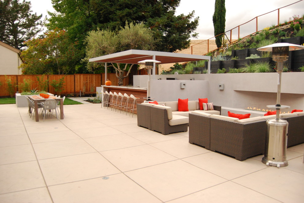 Design ideas for a large contemporary back patio in San Francisco with an outdoor kitchen, concrete paving and no cover.