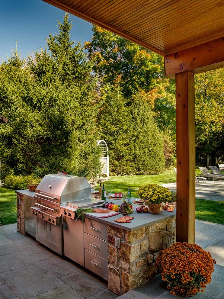 Inspiration for a medium sized farmhouse back patio in New York with an outdoor kitchen.
