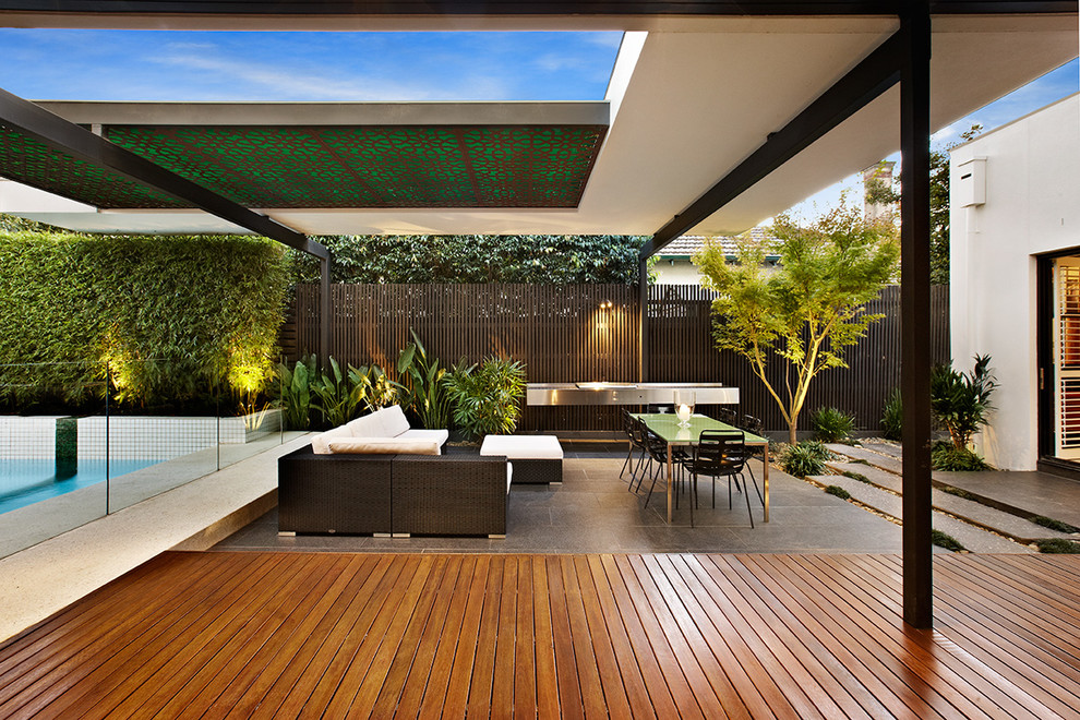 Idée de décoration pour une terrasse design.
