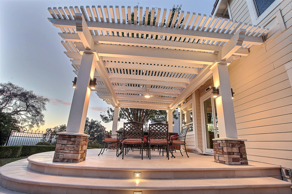 Inspiration for a medium sized traditional back patio in San Francisco with brick paving and a pergola.