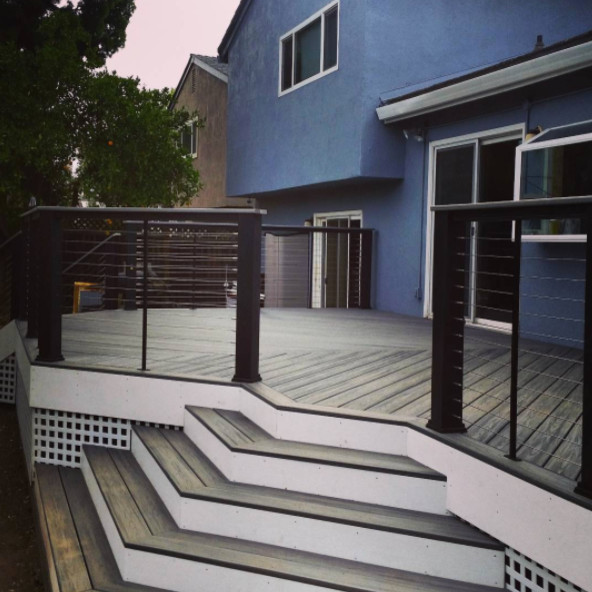 Inspiration for a medium sized classic back patio in San Diego with decking and no cover.