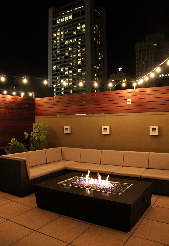 Mid-sized trendy backyard patio photo in San Francisco with a fire pit and no cover