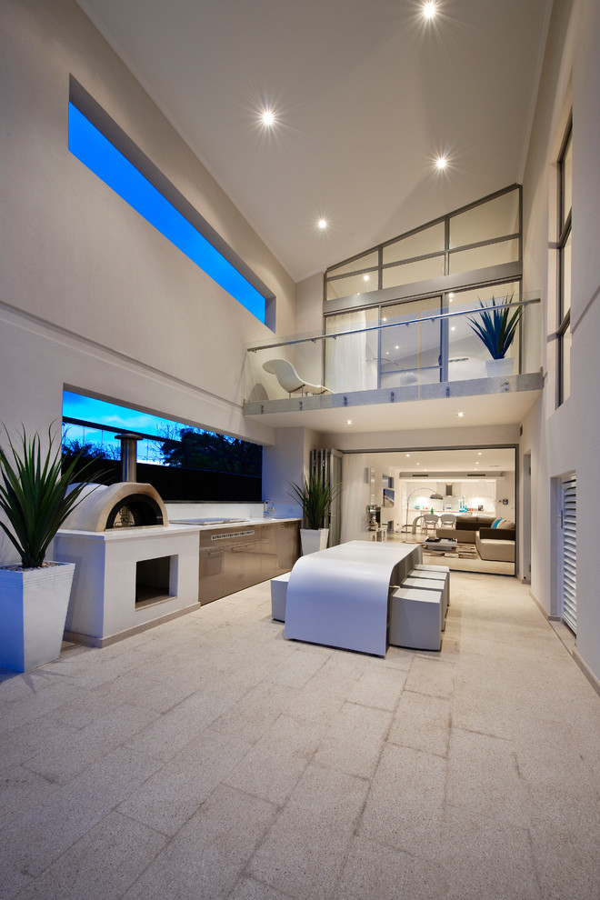 Contemporary courtyard patio in Perth with an outdoor kitchen and a roof extension.