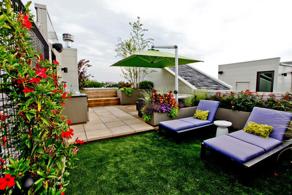 Patio - contemporary patio idea in Chicago with a fire pit