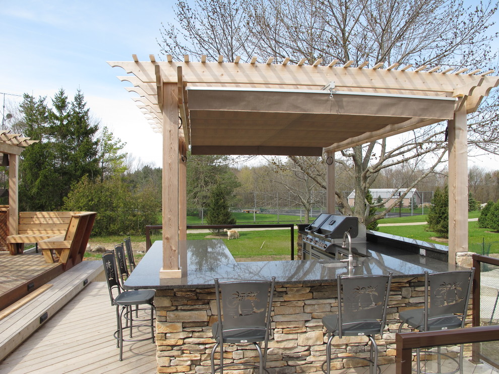 Double Retractable Canopies in Kitchener, Ontario Traditional Patio