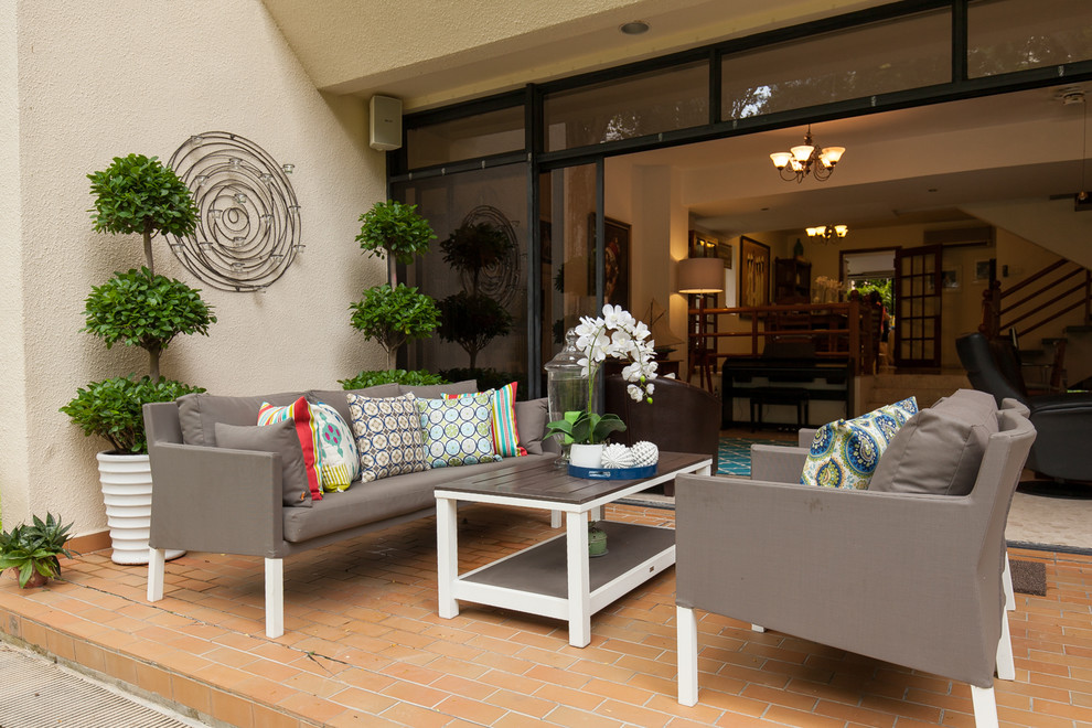 Example of a transitional patio design in Singapore