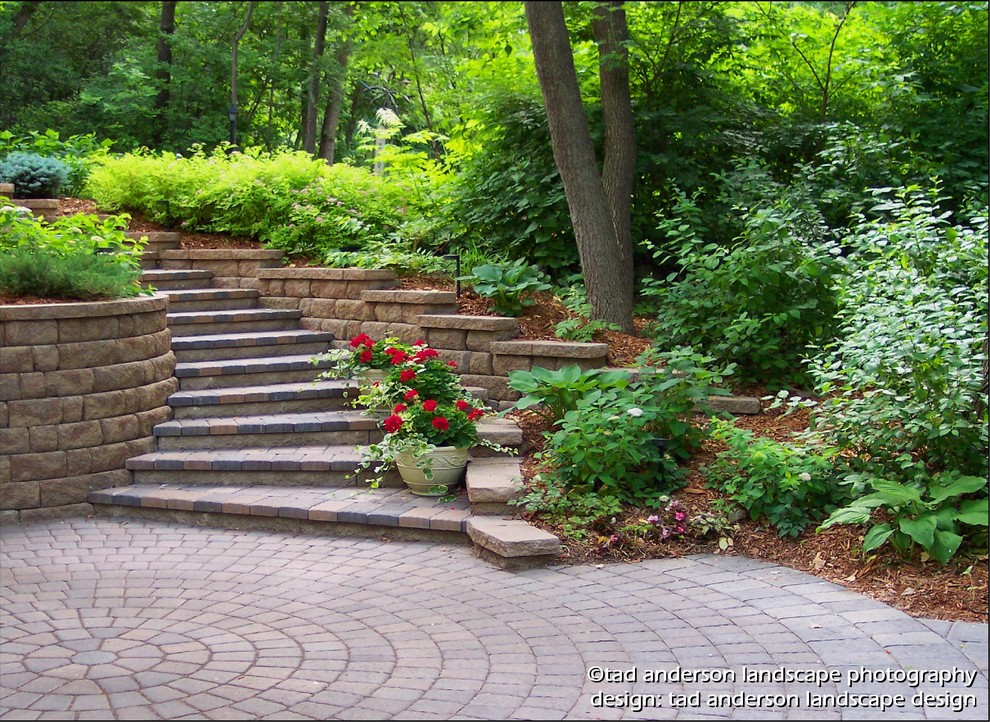 Design ideas for a contemporary front patio in Minneapolis with concrete paving.