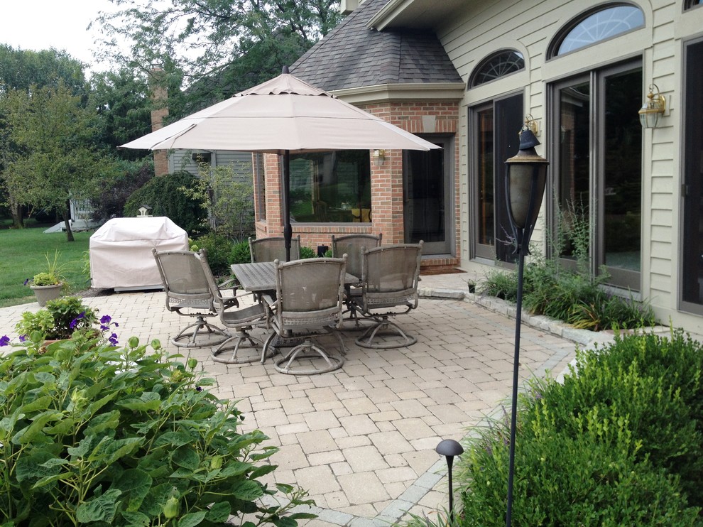 Dublin patio, stone wall, and plantings Traditional Patio