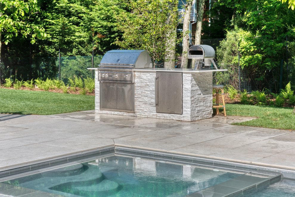 East Hampton House exterior barbeque and pool area Modern Patio