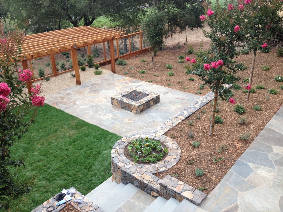 Patio - traditional backyard patio idea in San Francisco with a fire pit