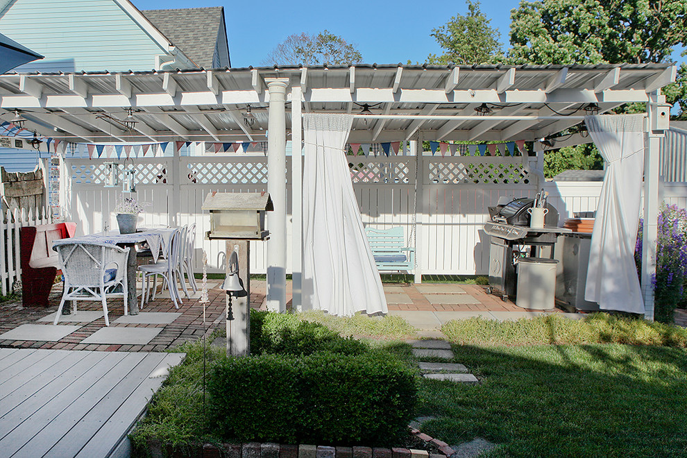 This is an example of a traditional patio in Columbus with a pergola.