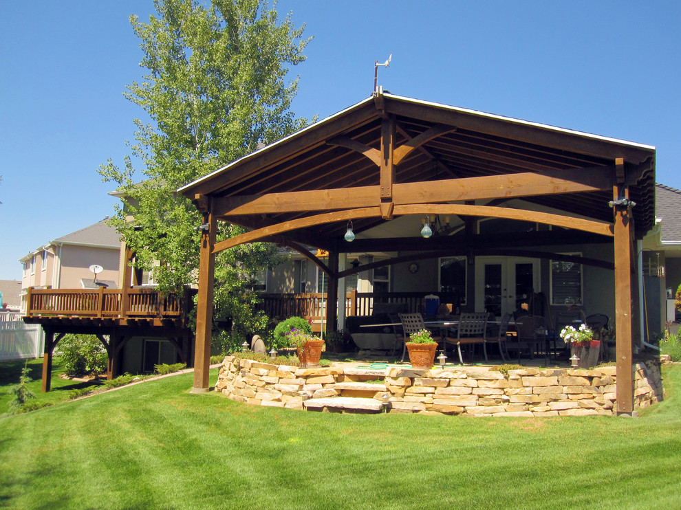 Photo of a large traditional back patio in Salt Lake City with a gazebo.